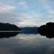 Lake Hauroko Princess mountains in back ground.
